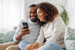 A couple looking at a phone